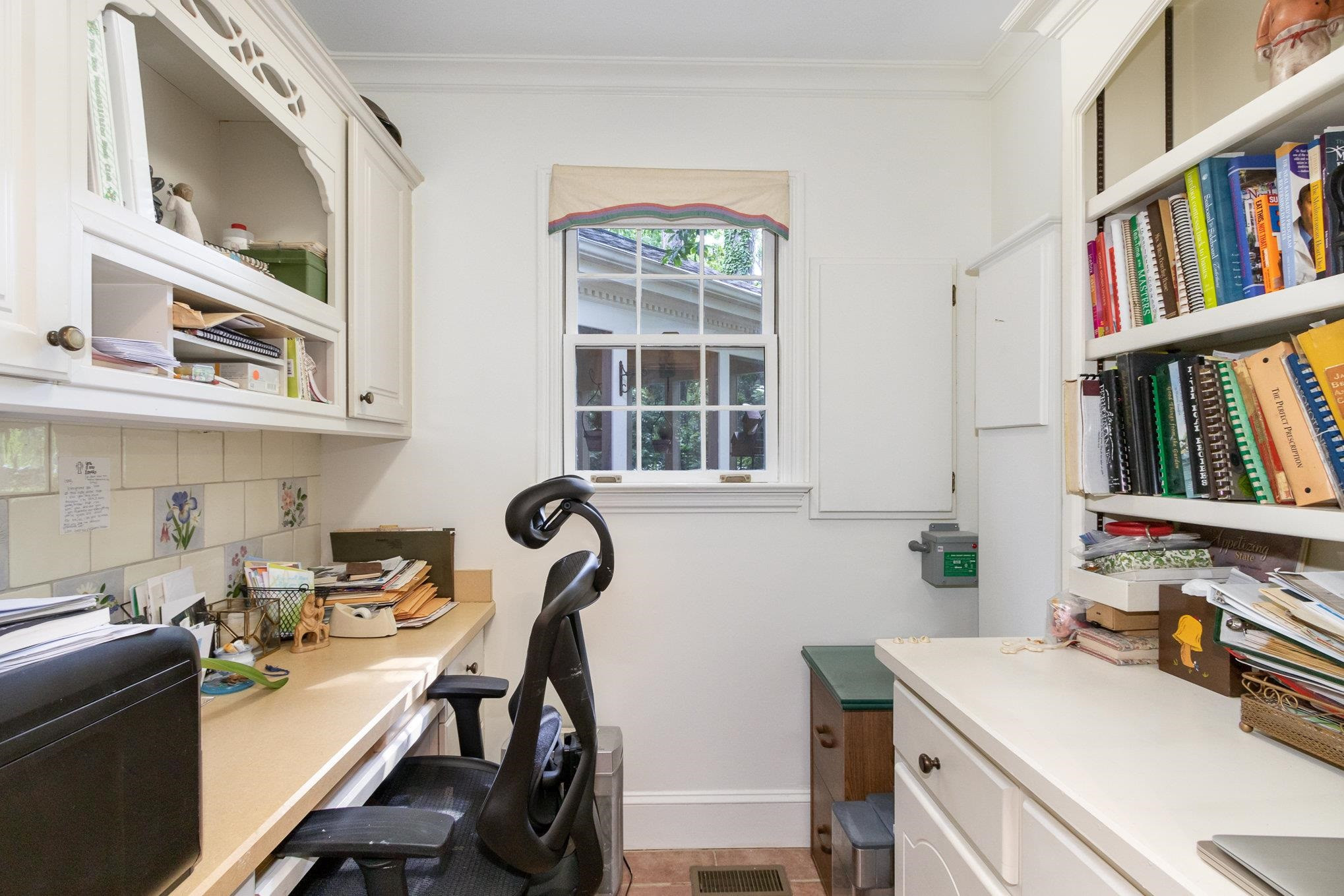 3327 Landor Road Raleigh, NC 27609 - Photo 30 of 60 Small office just inside the side entrance and right off the Kitchen which makes for a great drop off location or even mudroom. There are 2 other larger Basement rooms used as Offices as well. Office