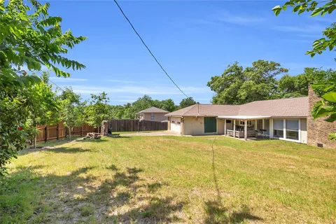 a view of a house with a swimming pool