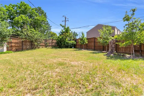 a view of a swimming pool with an outdoor space and seating area