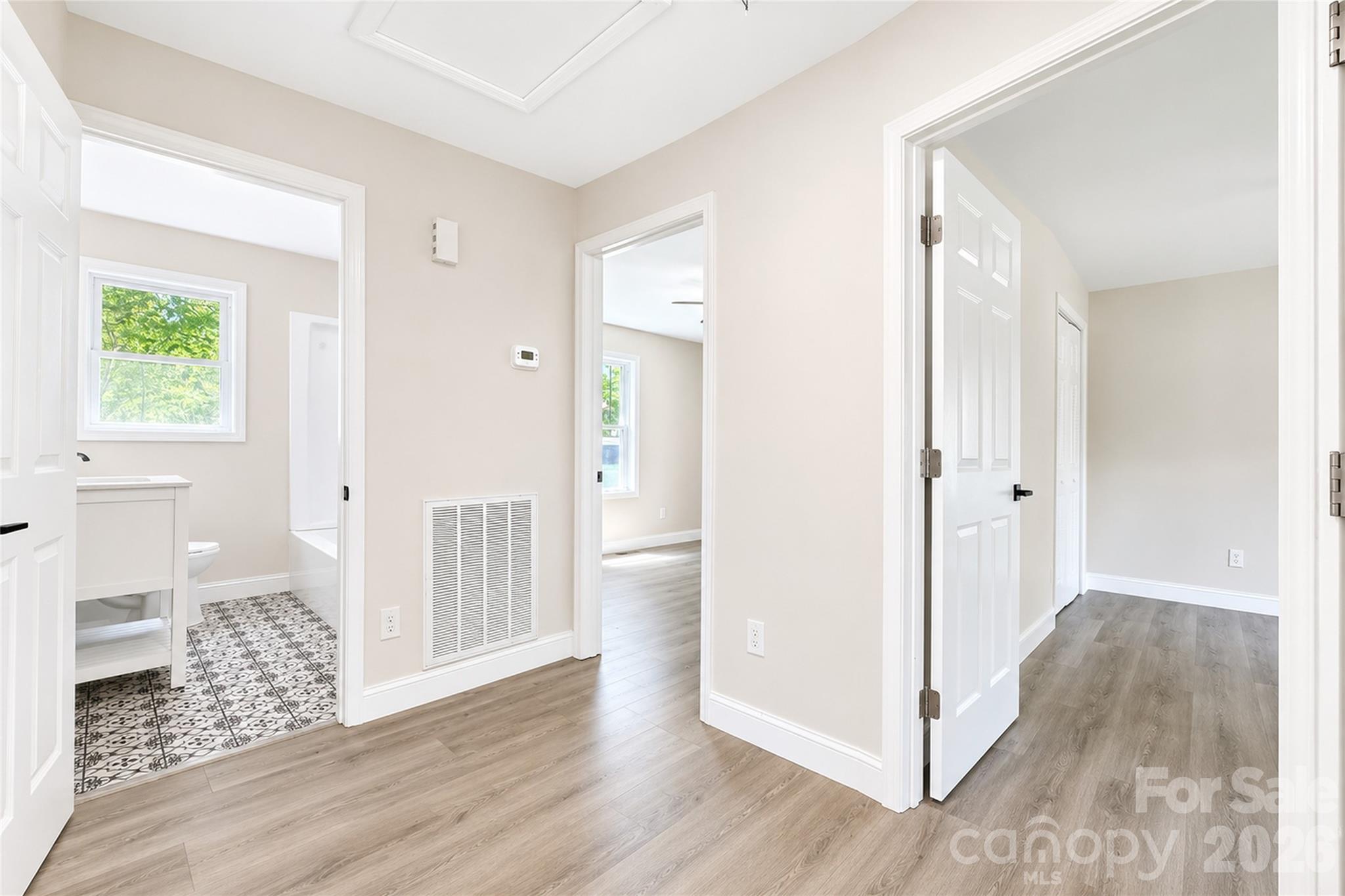 1403 Dudley Shoals Road Granite Falls, NC 28630 - Photo 13 of 34 a view of livingroom with hardwood floor and hallway