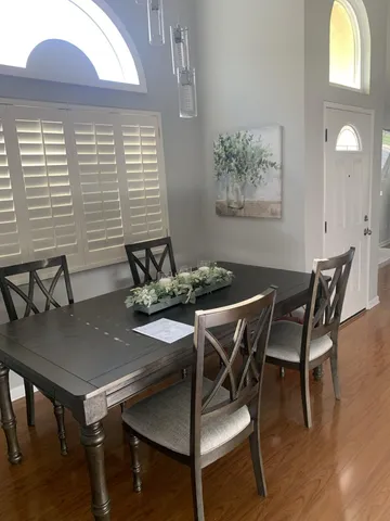 a workspace with furniture and window