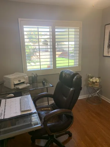 a bathroom with a shower and a toilet