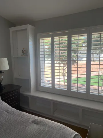 a view of a dining area with furniture window and outside view