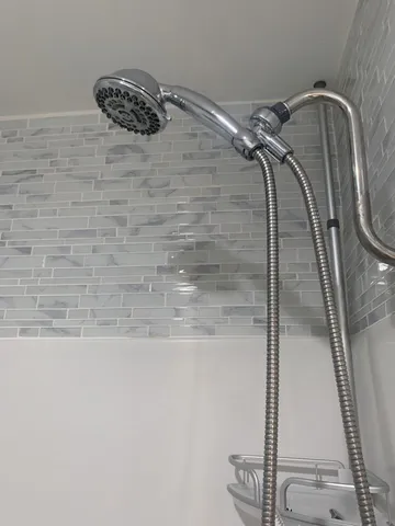 a view of a lake with houses in the back