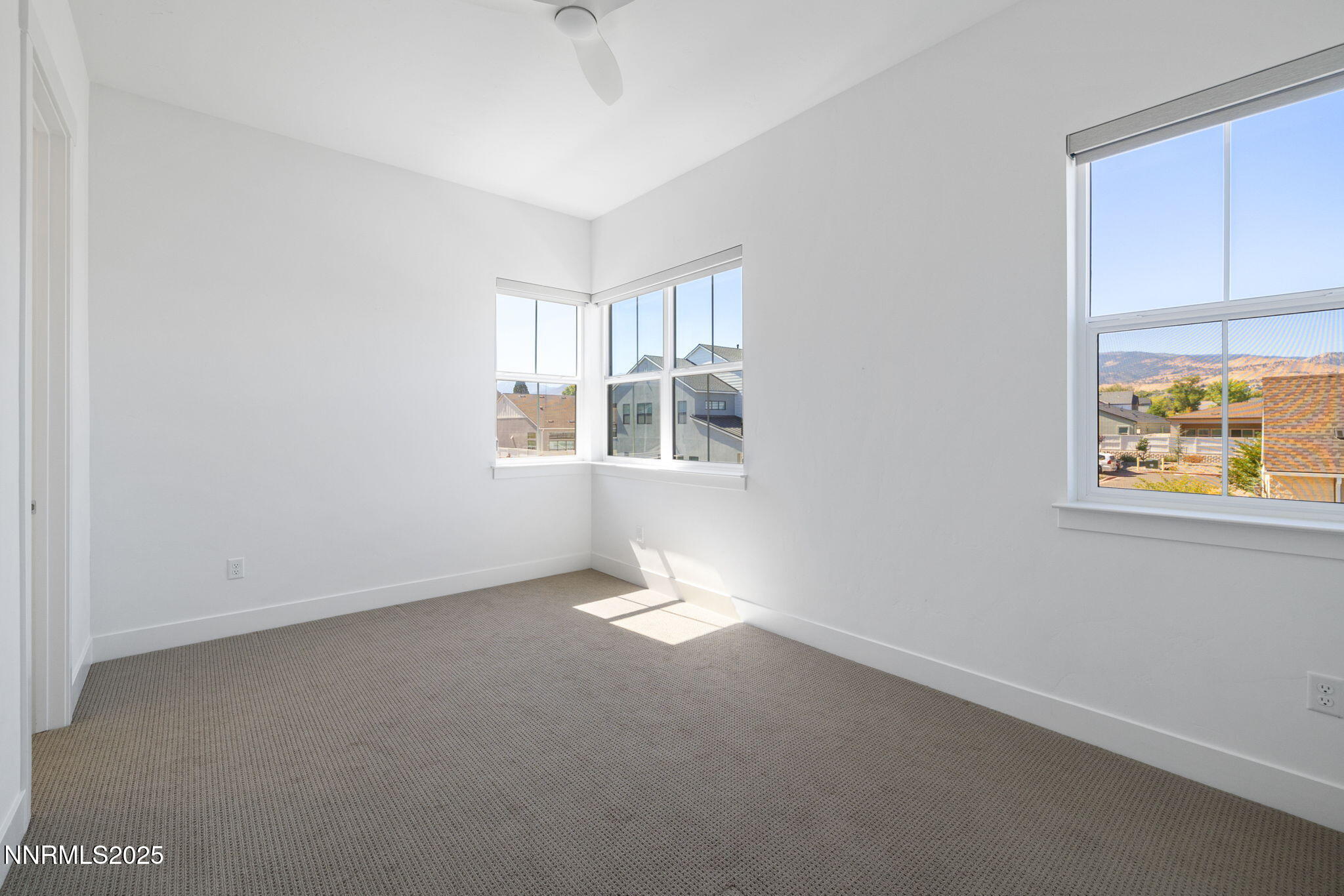 5406 Side Saddle Trail Reno, NV 89511 - Photo 27 of 39 an empty room with windows