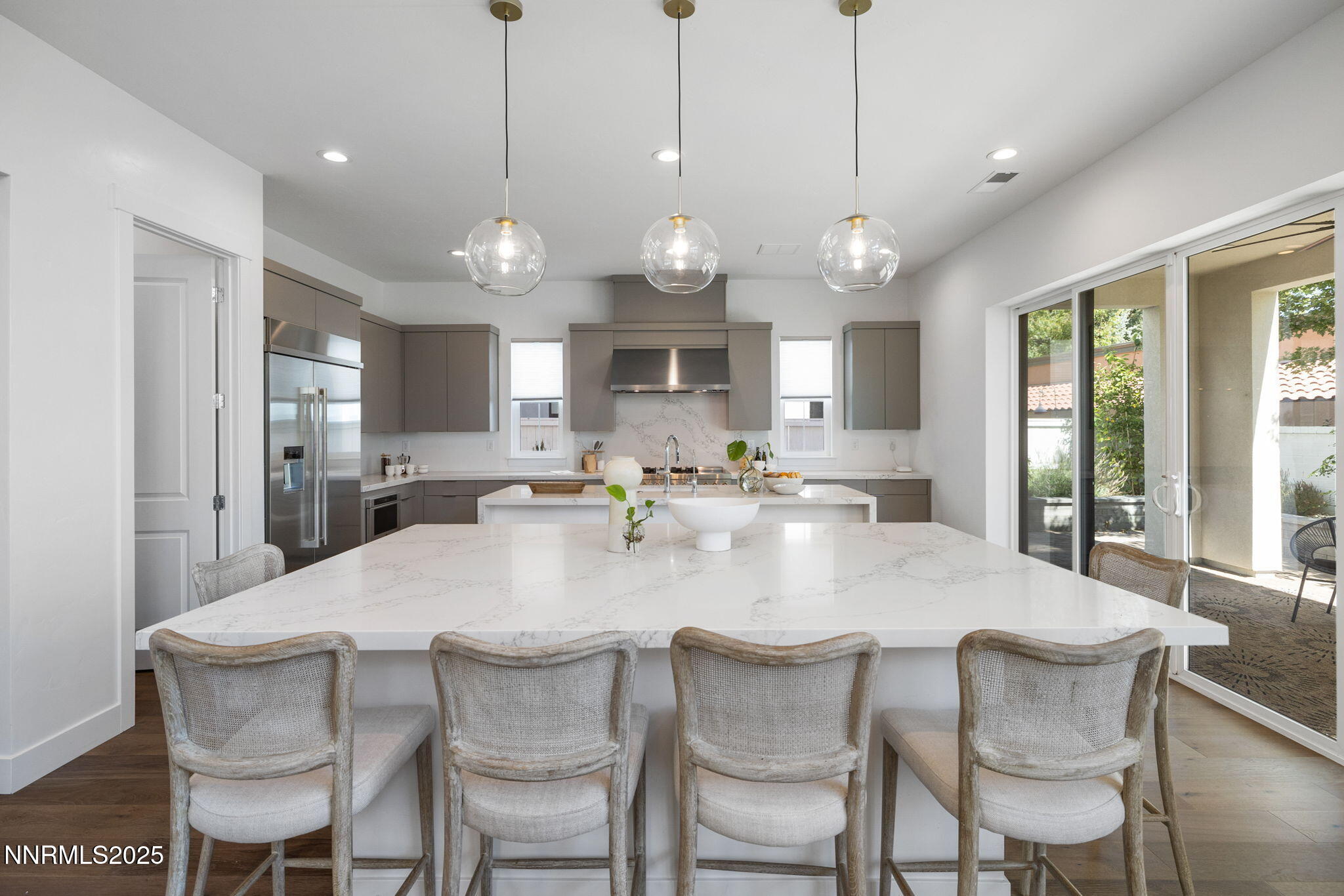 5406 Side Saddle Trail Reno, NV 89511 - Photo 7 of 39 a large kitchen with a table and chairs