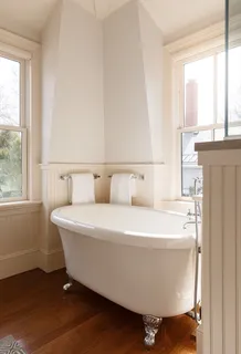 a close up of a bathtub in a bathroom