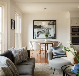 a living room with furniture and a table