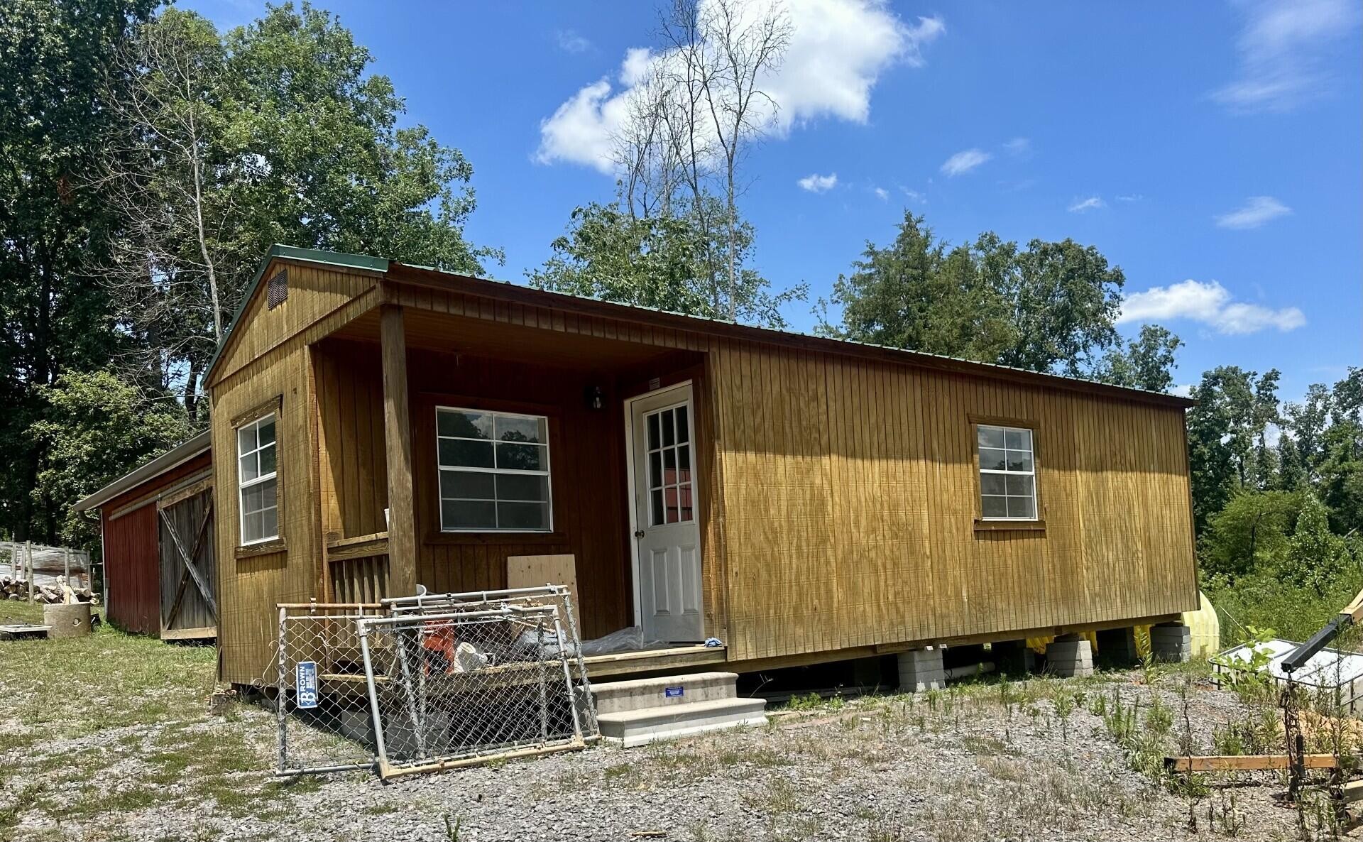 449 York Road Ocoee, TN 37361 - Photo 21 of 26 a side view of a house with a yard