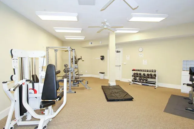 a swimming pool with outdoor seating and yard