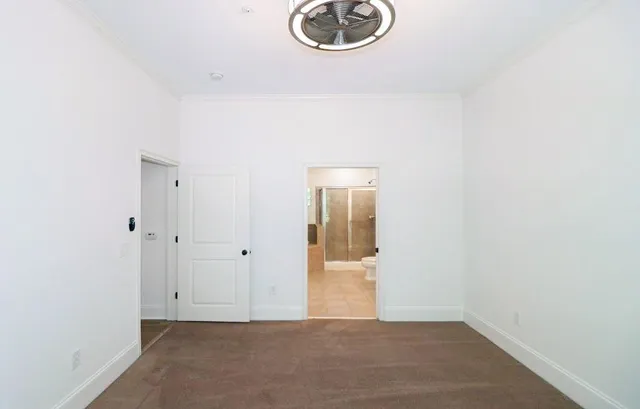 a view of a hallway with closet