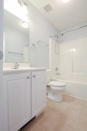 a bathroom with a toilet sink and a bathtub