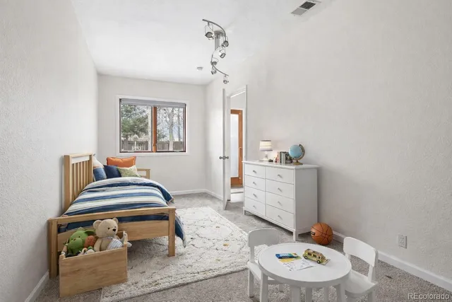 a room with furniture and window