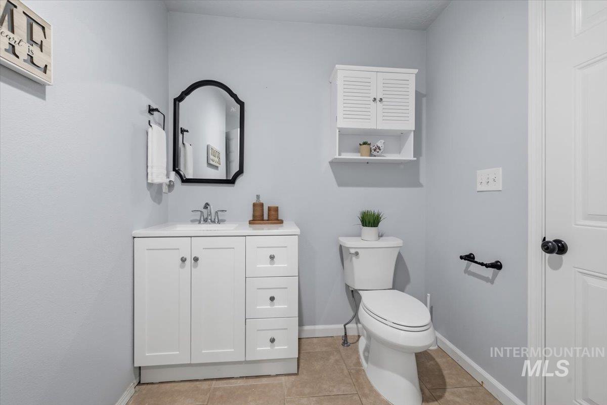 25022 Tumbleweed Road Middleton, ID 83644 - Photo 25 of 41 Bathroom with vanity and light tile patterned floors