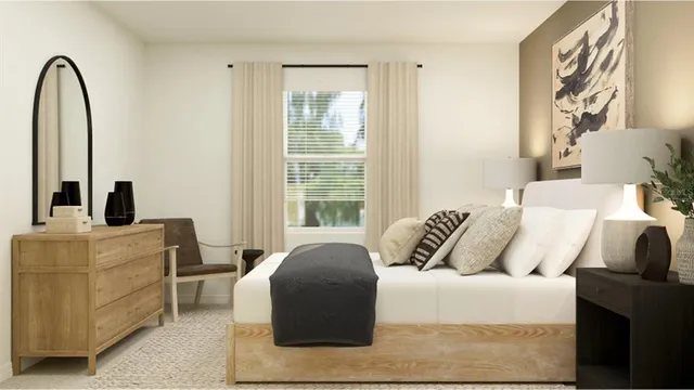 a bedroom with a bed and a large window