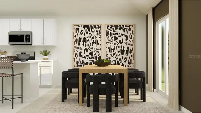 a dining room with furniture and window