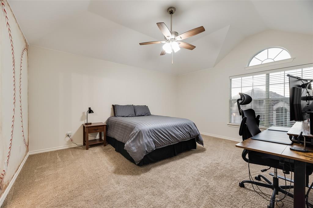 11920 Vienna Apple Road Fort Worth, TX 76244 - Photo 32 of 40 Upstairs oversized bedroom with carpet, ceiling fan, large walk-in closet and ensuite Jack & Jill bathroom at 11920 Vienna Apple in Villages of Woodland Springs community in North Fort Worth