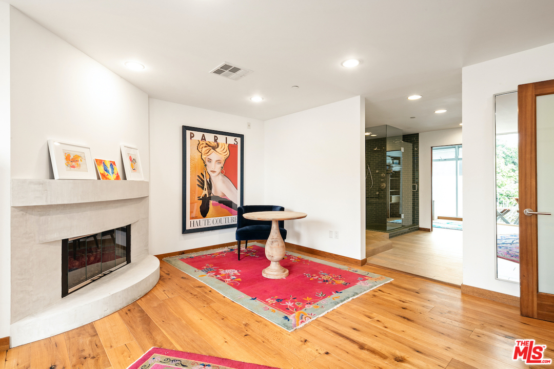 512 Brooks Avenue, Unit 4 Venice, CA 90291 - Photo 13 of 25 a living room with furniture and a fireplace