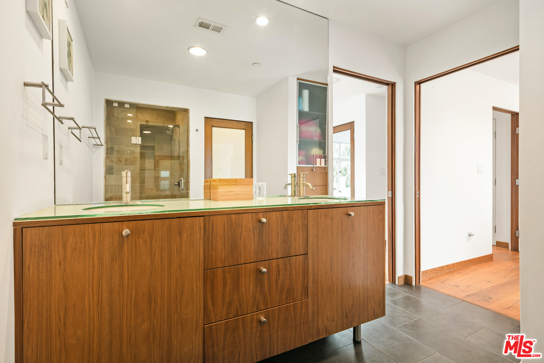 512 Brooks Avenue, Unit 4 Venice, CA 90291 - Photo 18 of 25 a view of an empty room with wooden floor and a window