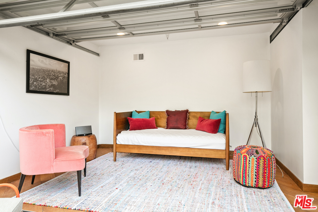 512 Brooks Avenue, Unit 4 Venice, CA 90291 - Photo 3 of 25 a living room with furniture and a wooden floor