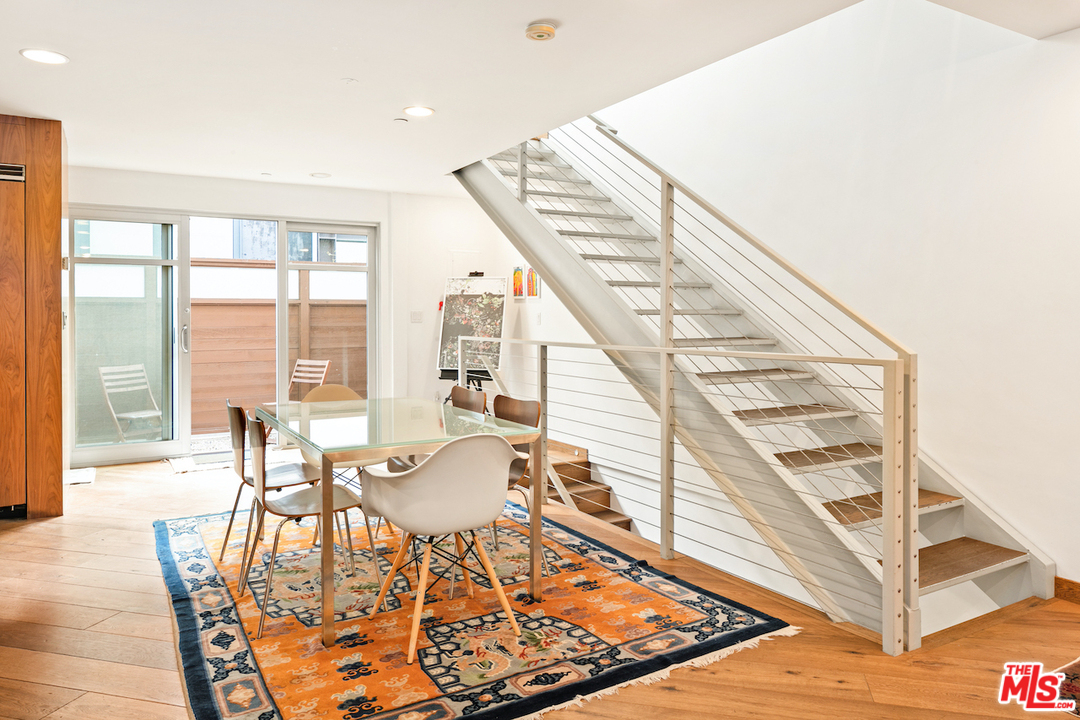 512 Brooks Avenue, Unit 4 Venice, CA 90291 - Photo 10 of 25 a view of dining room and hall with wooden floor