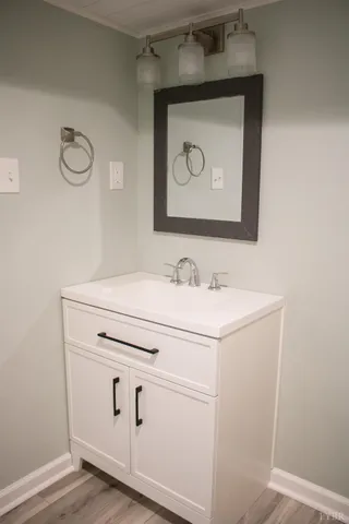 a view of a kitchen from the hallway