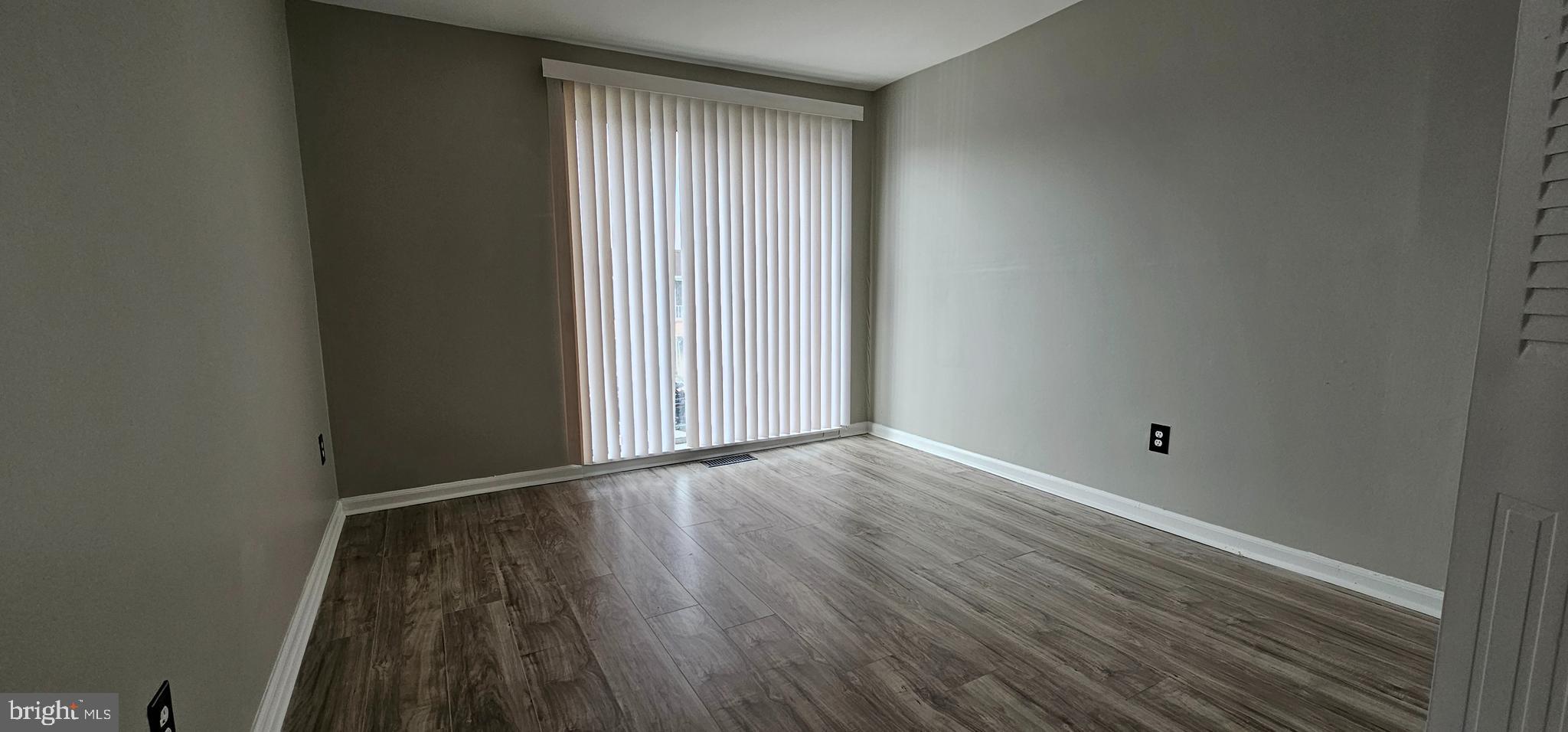 501 Germantown Court Warminster, PA 18974 - Photo 11 of 12 a view of an empty room with wooden floor