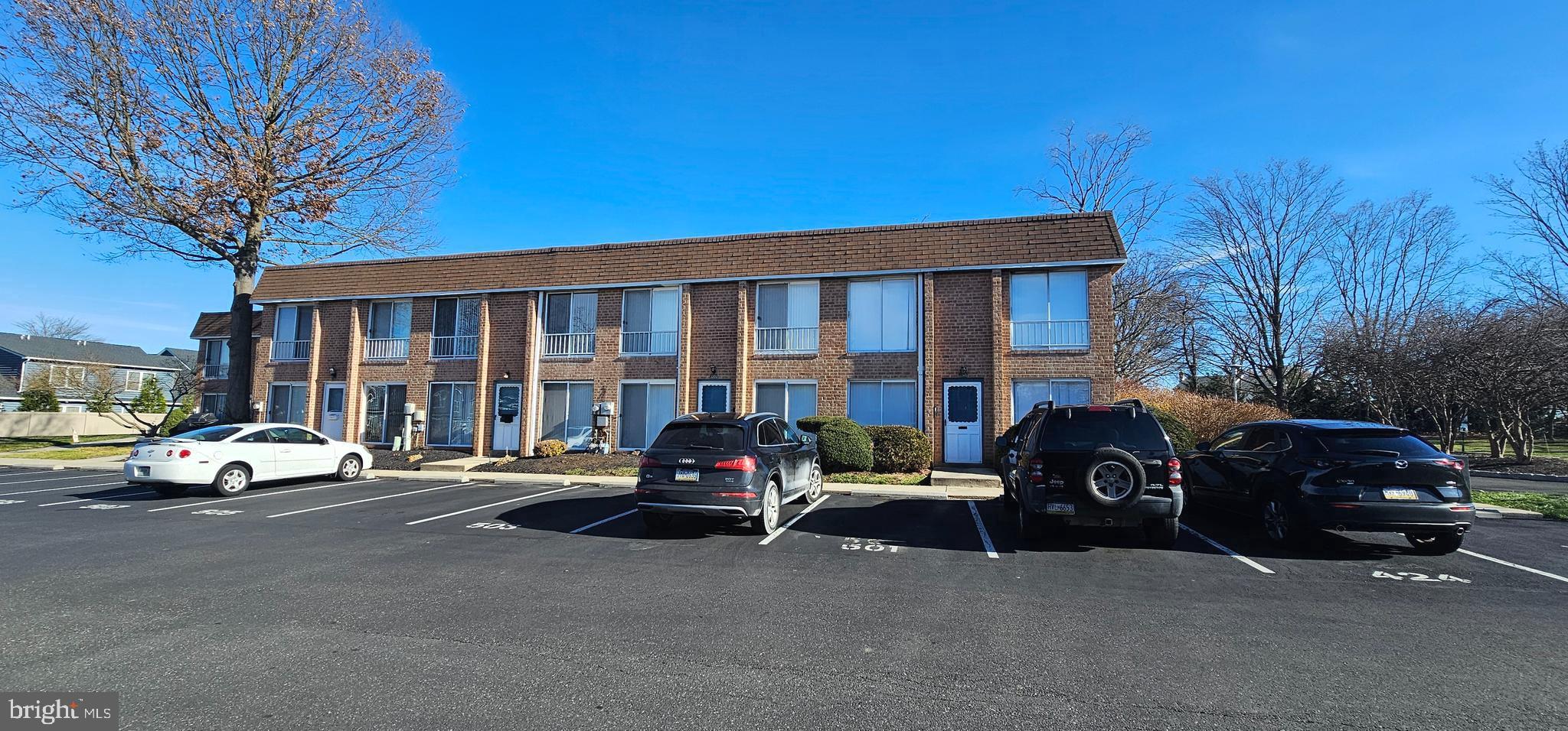 501 Germantown Court Warminster, PA 18974 - Photo 2 of 12 a view of a car parked in front of a house