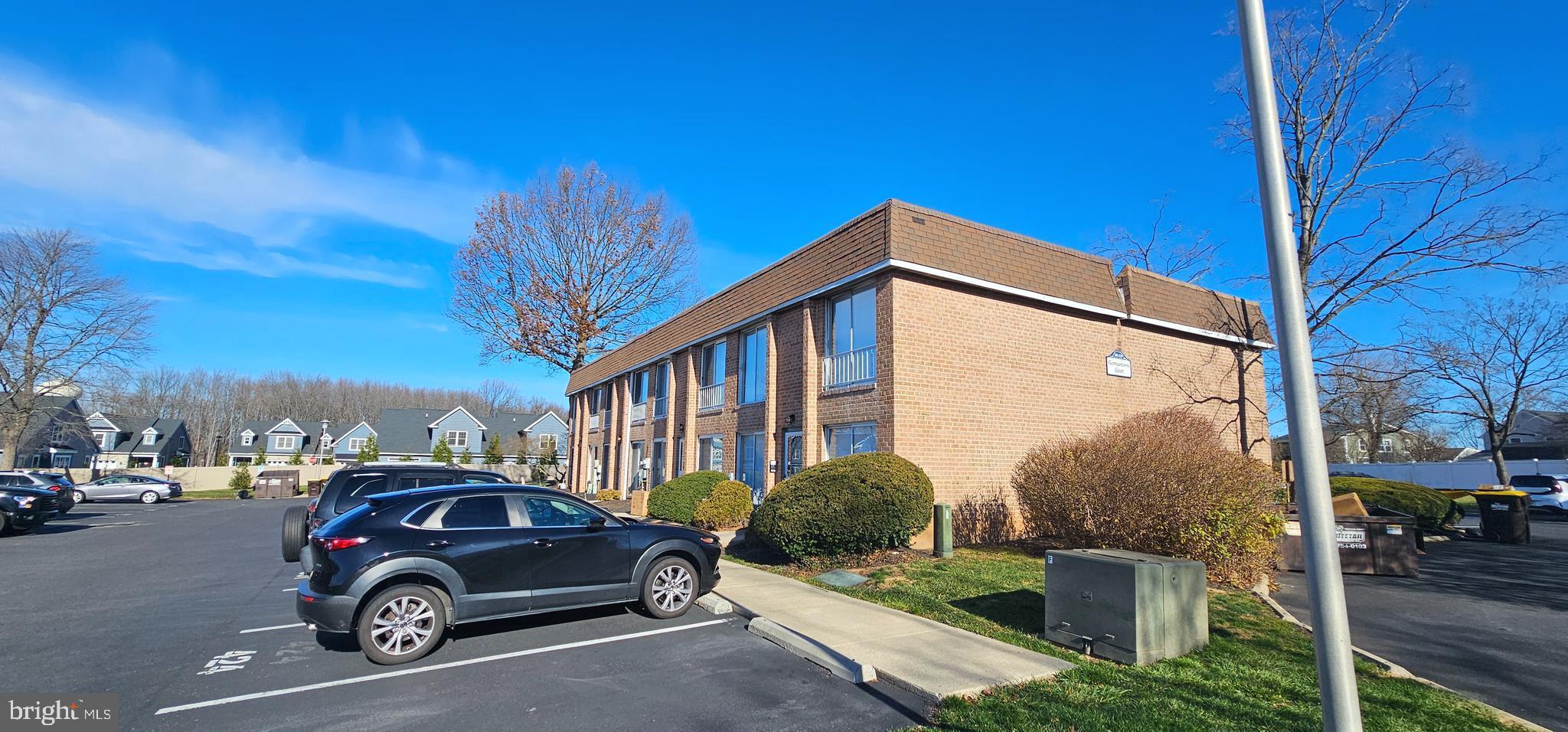 501 Germantown Court Warminster, PA 18974 - Photo 3 of 12 a view of a car parked in front of a house