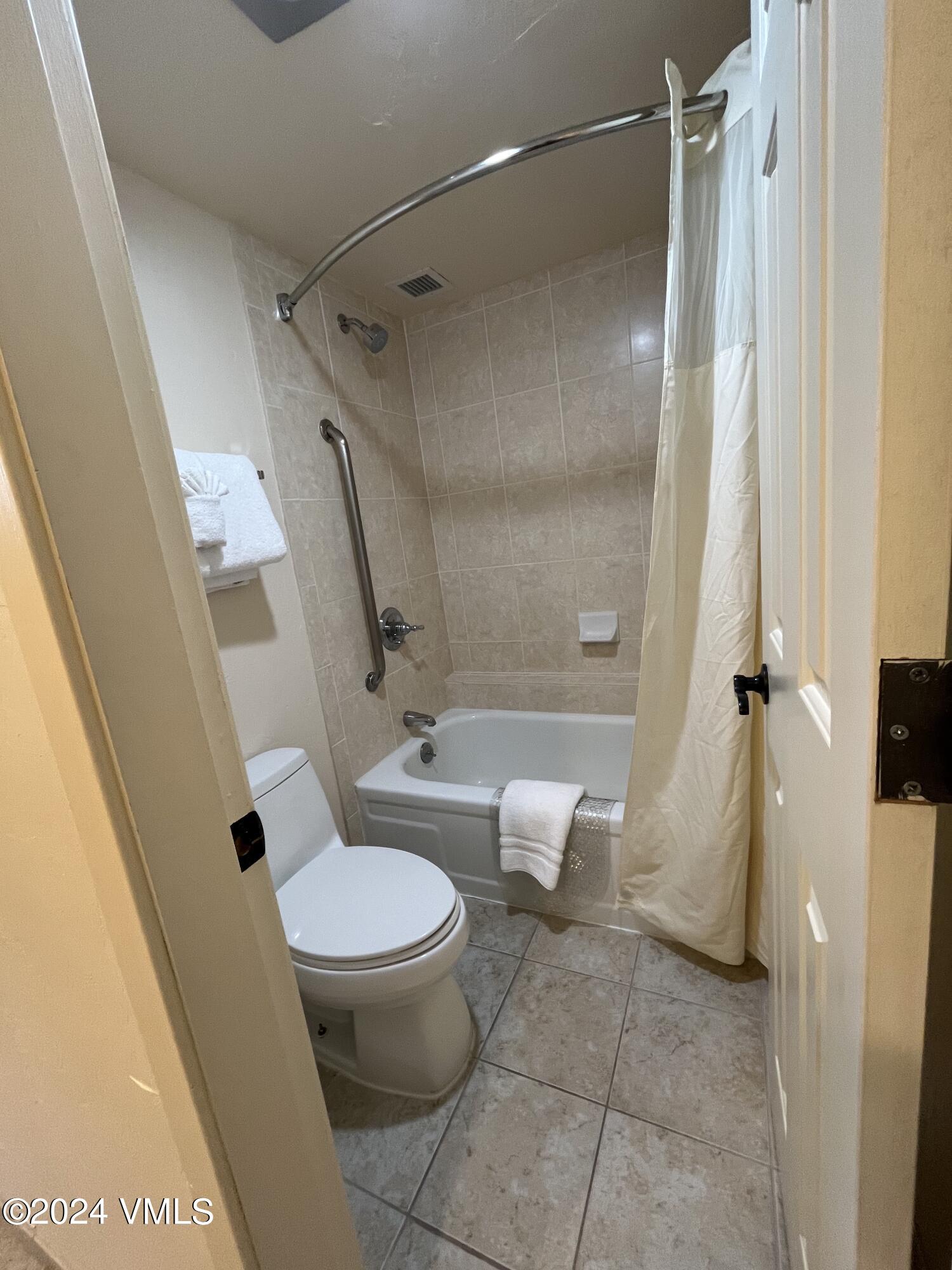 1020 Vail View Drive, Unit 341221 Vail, CO 81657 - Photo 13 of 26 a bathroom with a toilet and a shower