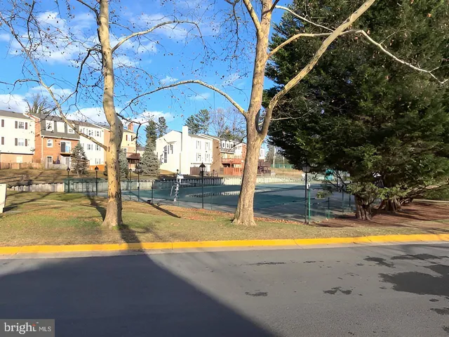 a view of swimming pool with outdoor seating