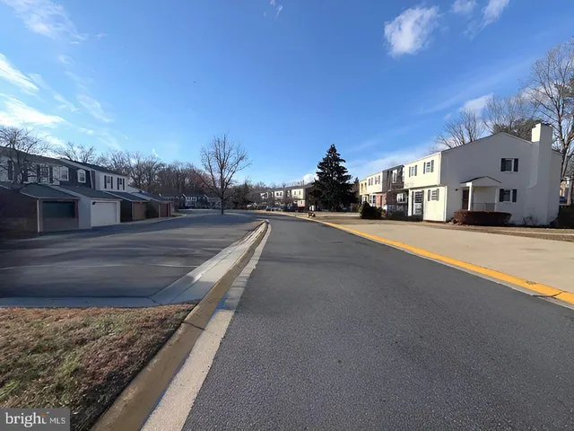a view of a street with houses
