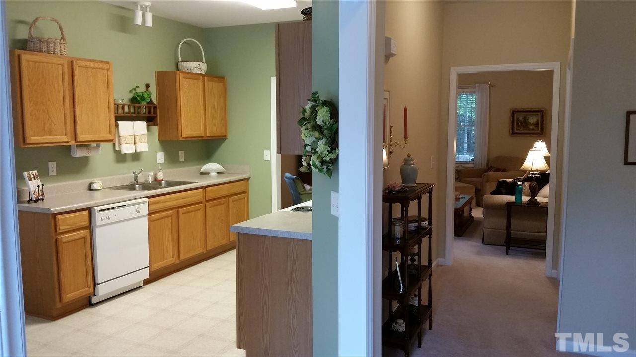 5425 Neuse Forest Road Raleigh, NC 27616 - Photo 2 of 25 a kitchen with a sink and cabinets