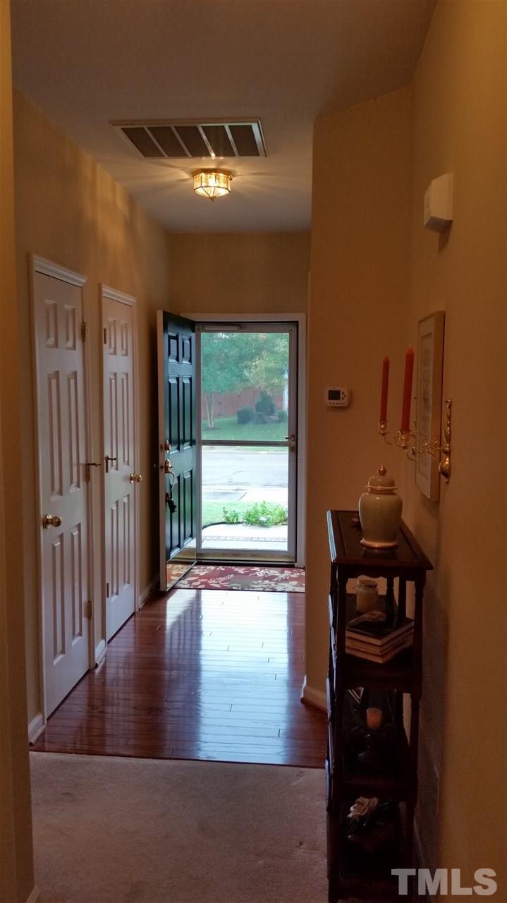 5425 Neuse Forest Road Raleigh, NC 27616 - Photo 16 of 25 a view of empty room with wooden floor and fan