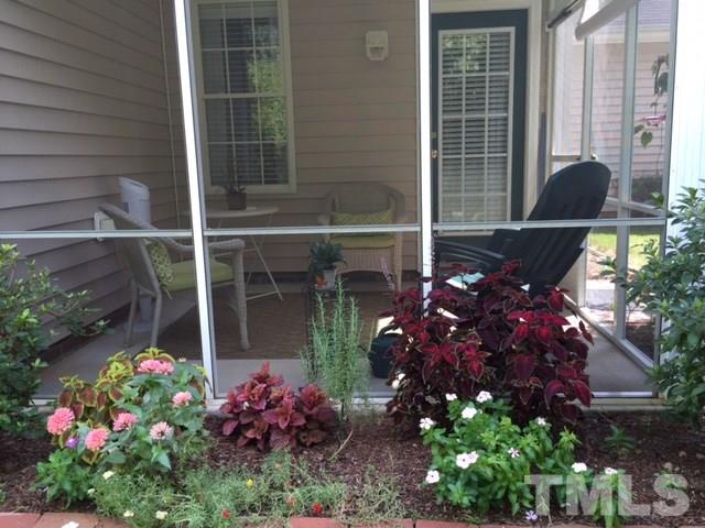 5425 Neuse Forest Road Raleigh, NC 27616 - Photo 17 of 25 a view of flowers in the front of the house