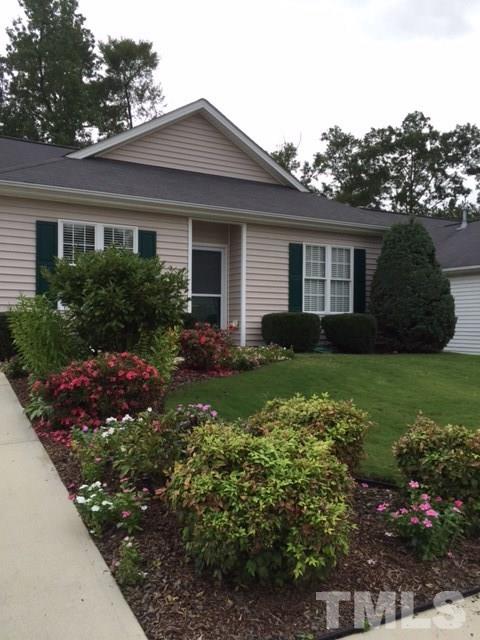 5425 Neuse Forest Road Raleigh, NC 27616 - Photo 22 of 25 a front view of house with yard and green space