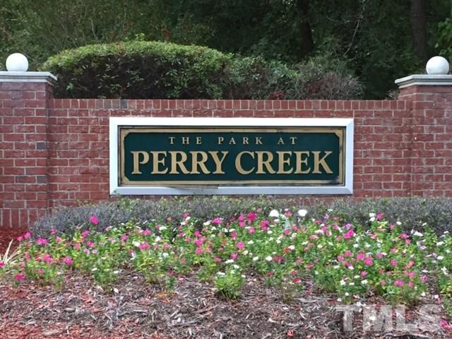 5425 Neuse Forest Road Raleigh, NC 27616 - Photo 25 of 25 a sign that is in front of flowers