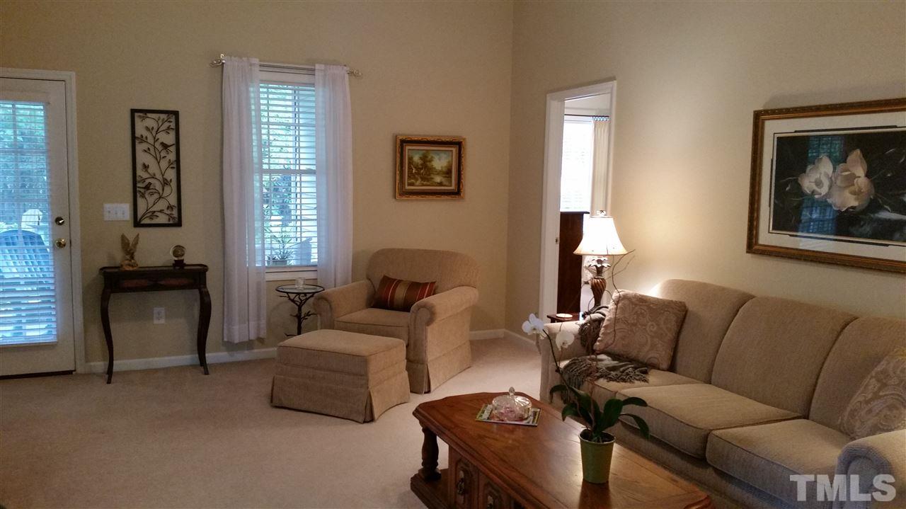5425 Neuse Forest Road Raleigh, NC 27616 - Photo 5 of 25 a living room with furniture and a window