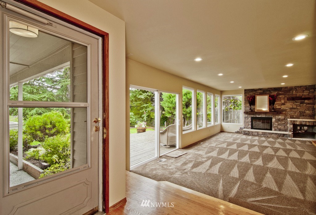 22324 4th Avenue Southeast Bothell, WA 98021 - Photo 8 of 24 a large bedroom with a bed and large windows