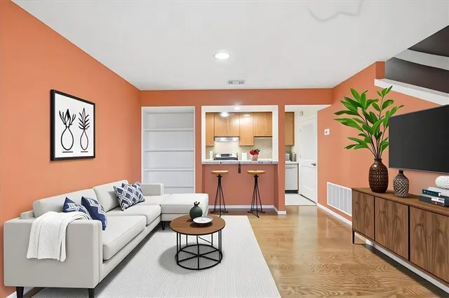 a kitchen with a stove a sink and a refrigerator