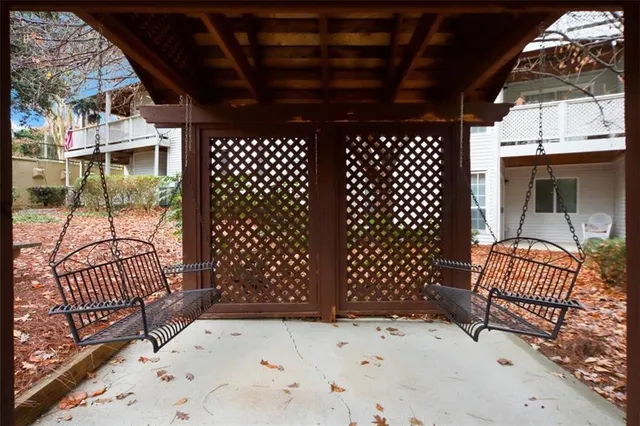 a front view of house with yard outdoor seating and barbeque oven