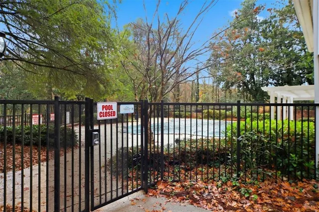 a view of a park with sitting area