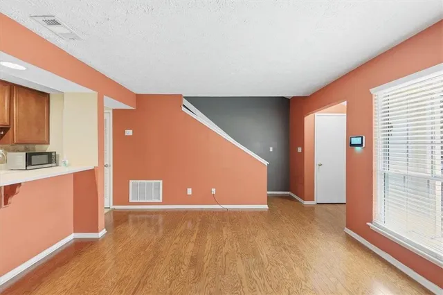 a view of a livingroom with a furniture