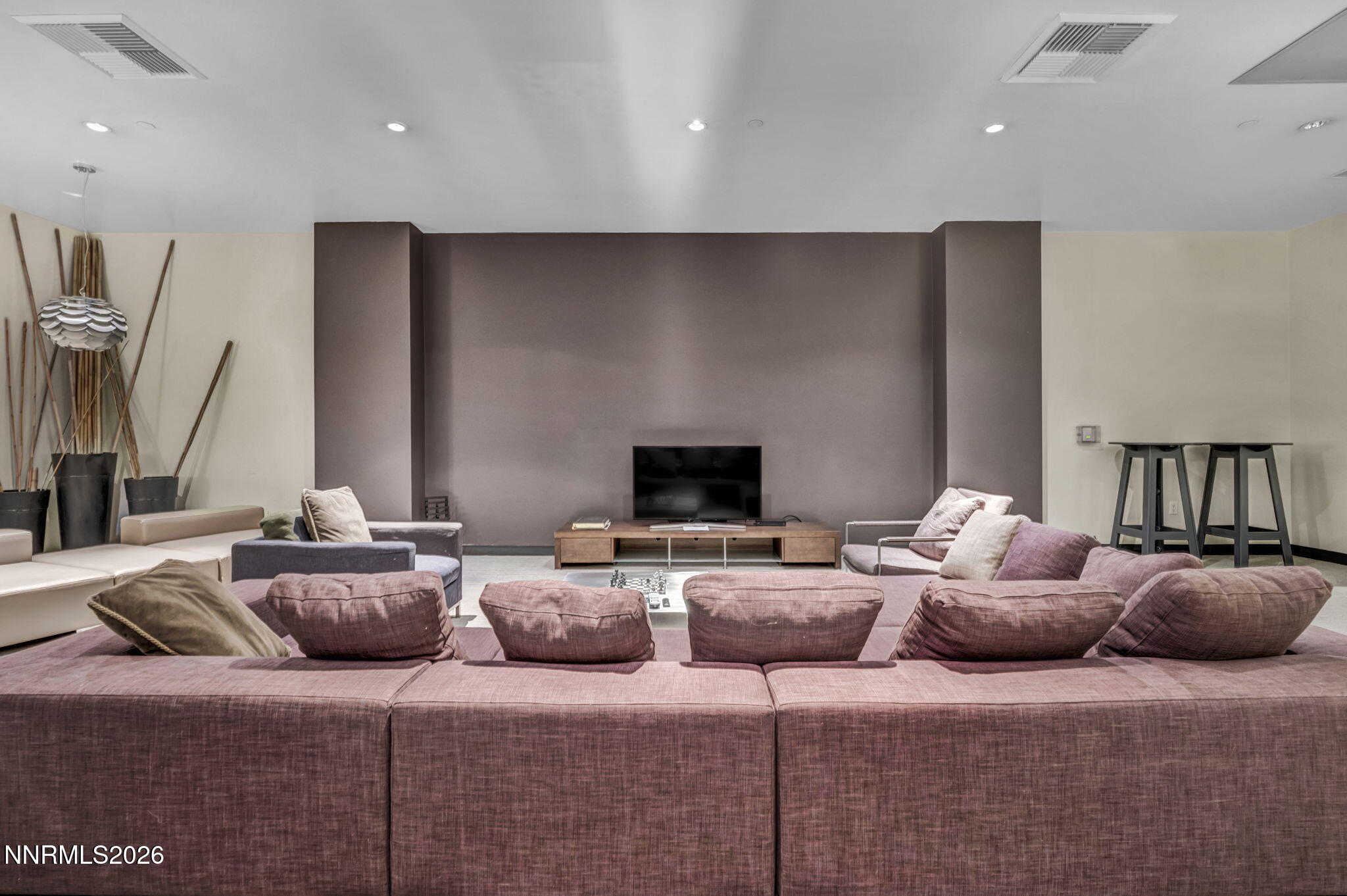 255 North Sierra Street, Unit 1208 Reno, NV 89501 - Photo 35 of 37 a living room with furniture and a flat screen tv
