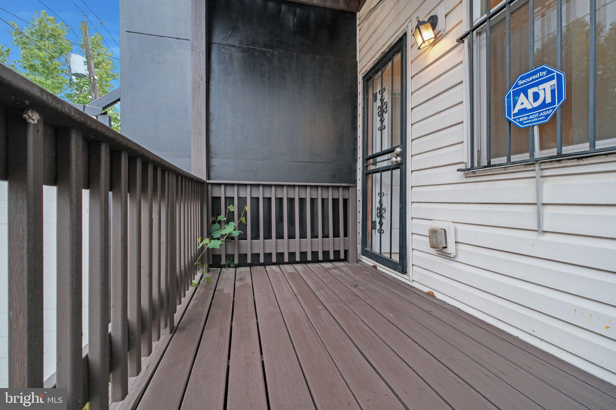 2803 North Capitol Street Northeast Washington, DC 20002 - Photo 11 of 37 Back Porch Leading to Backyard & Parking