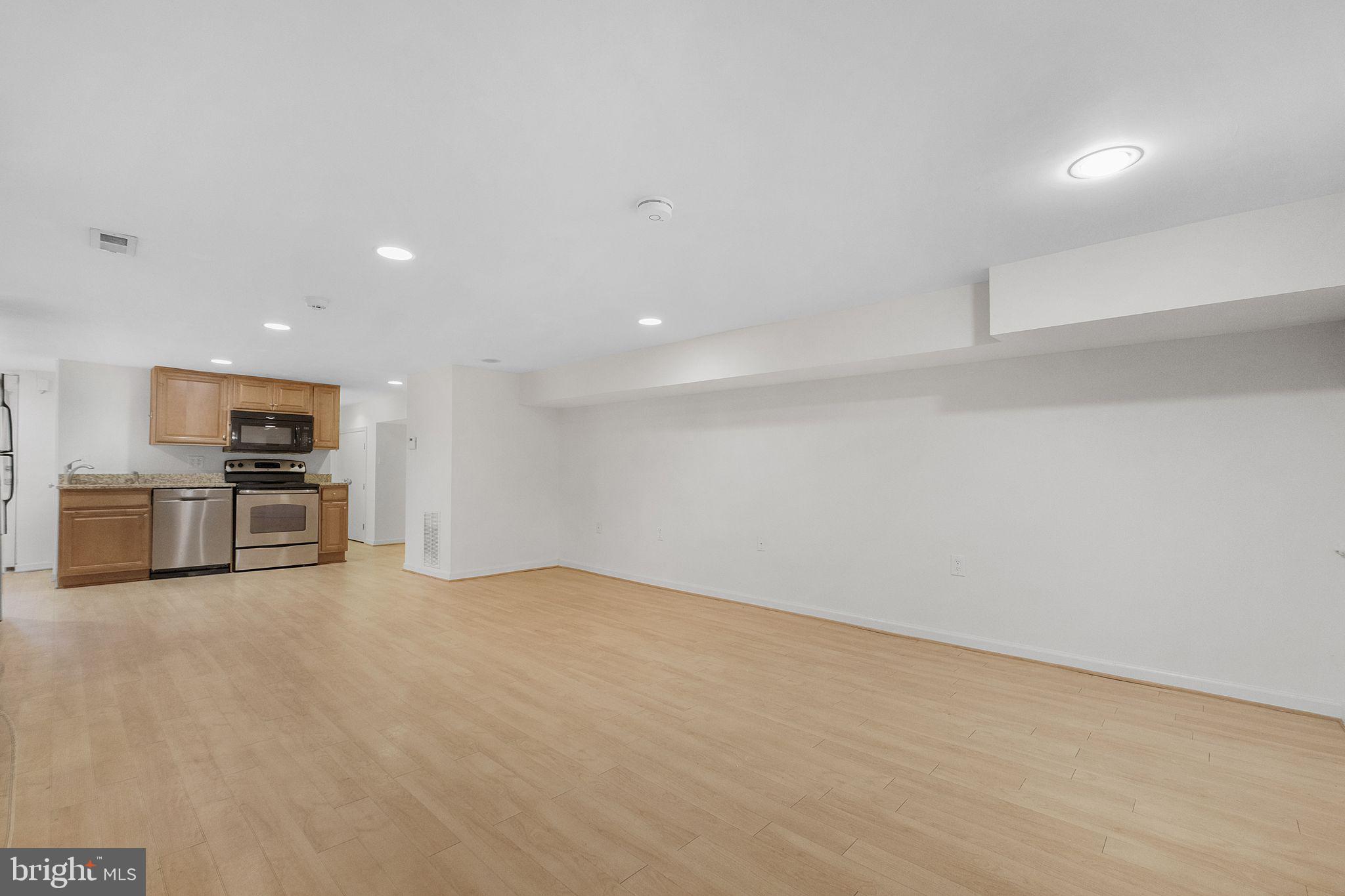 2803 North Capitol Street Northeast Washington, DC 20002 - Photo 31 of 37 Basement Open Layout Living Room & Kitchen