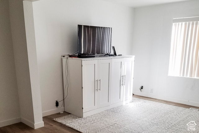 2855 South 1000 West Perry, UT 84302 - Photo 38 of 142 Detailed view of wood finished floors and baseboards