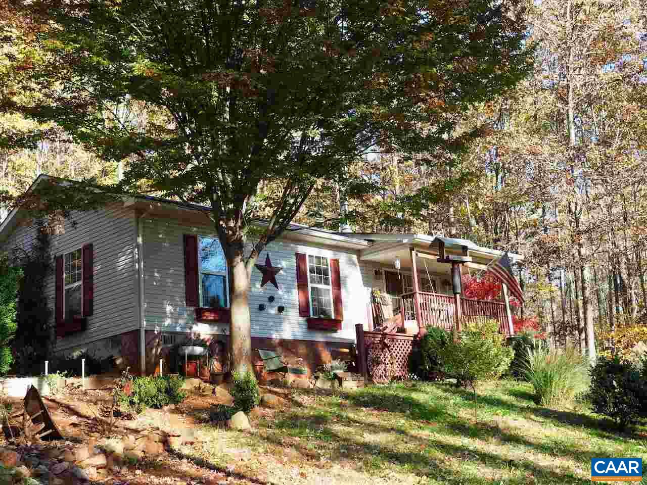 4346 Sharon Road Esmont, VA 22937 - Photo 1 of 17 a front view of a house with a yard