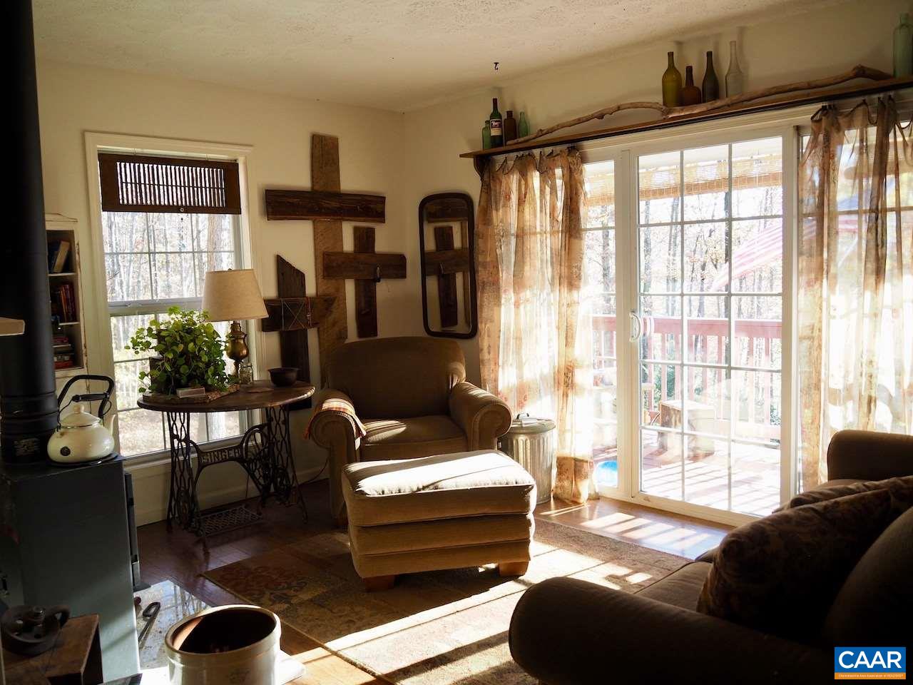 4346 Sharon Road Esmont, VA 22937 - Photo 8 of 17 a living room with furniture and a large window