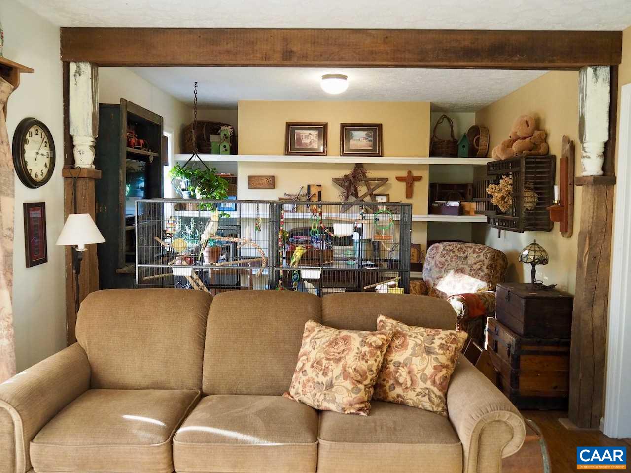 4346 Sharon Road Esmont, VA 22937 - Photo 9 of 17 a living room with furniture and a clock